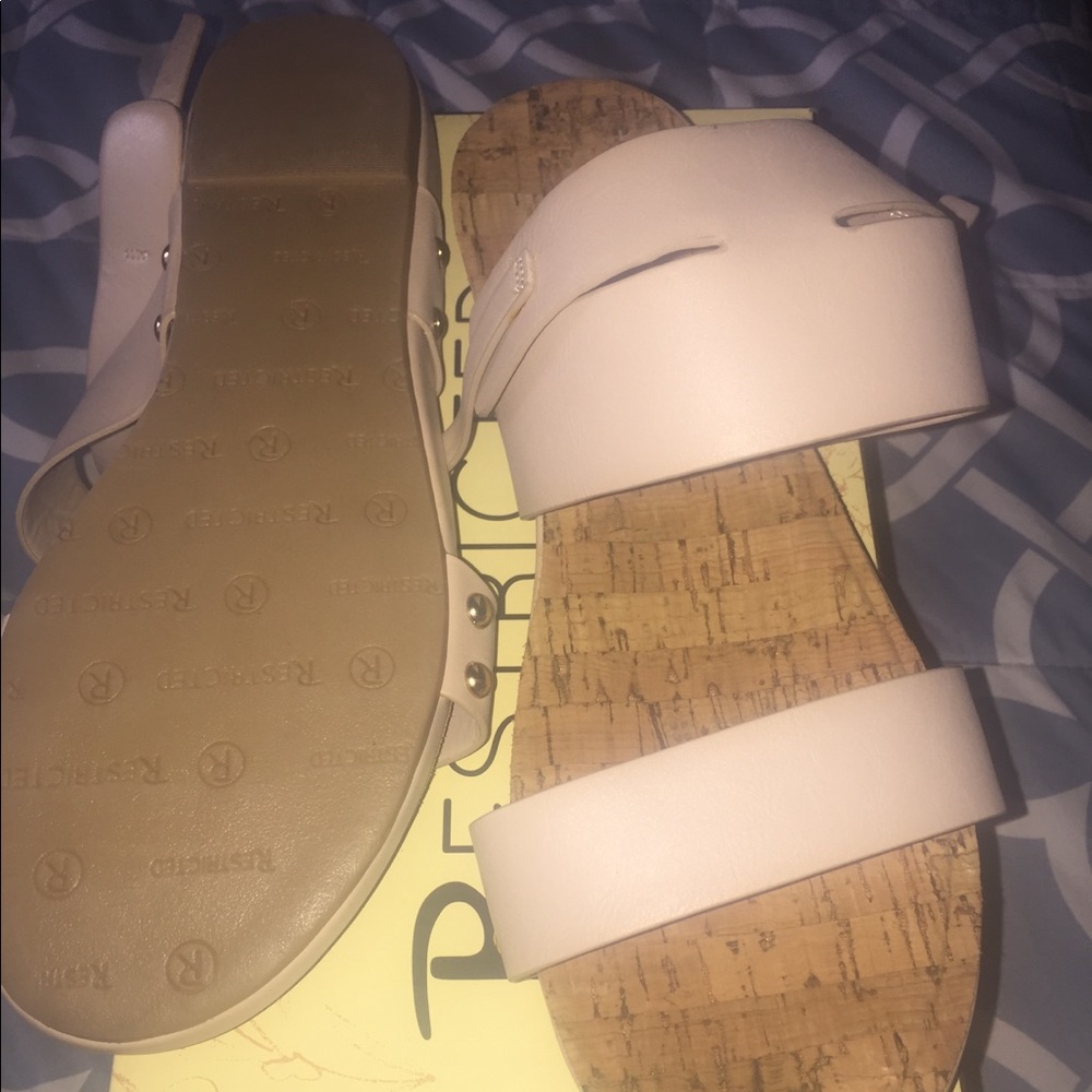 Never worn Restricted sandals.